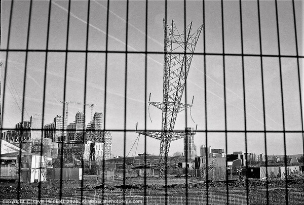 Upside down electricity pylon. Greenwich, London  Picture Board by Kevin Plunkett