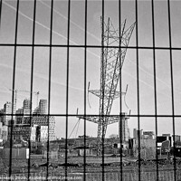 Buy canvas prints of Upside down electricity pylon. Greenwich, London  by Kevin Plunkett
