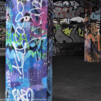 Buy canvas prints of A graffiti covered walls and pillars of  London by Kevin Plunkett