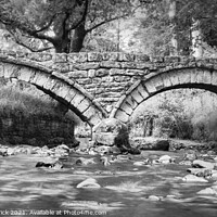 Buy canvas prints of Wycoller Packhorse Bridge Black and White by Heather Sheldrick