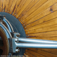 Buy canvas prints of Bancroft Mill Flywheel Close-up by Heather Sheldrick