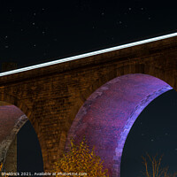 Buy canvas prints of Night Train Over Burnley Viaduct by Heather Sheldrick
