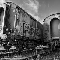Buy canvas prints of Rusty Railway Carriages with Graffiti by Heather Sheldrick