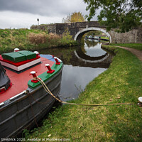 Buy canvas prints of Barge moored on Leeds and Liverpool Canal at Barno by Heather Sheldrick