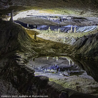 Buy canvas prints of Ingleborough: Stalactites and Stalagmites reflections in cave pool by Heather Sheldrick
