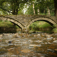 Buy canvas prints of Wycoller Packhorse Bridge and Beck by Heather Sheldrick