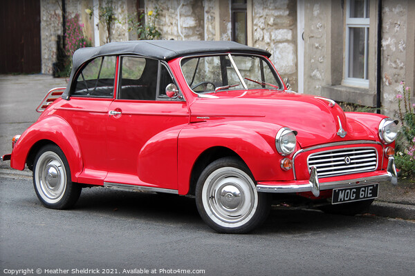 Morris Minor 1000 in Red Picture Board by Heather Sheldrick