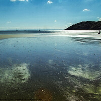 Buy canvas prints of Reflecting on Oxwich Bay, Gower. by Paddy Art