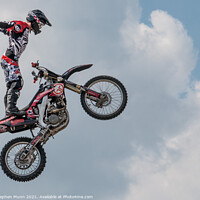Buy canvas prints of Flying Motorbike Stunt Man by Stephen Munn