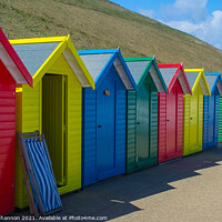 Buy canvas prints of Row of Beach Huts at Whitby by Michael Shannon