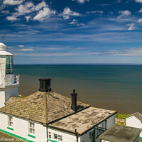 Buy canvas prints of Looking out to sea from the Whitby lighthouse by Michael Shannon