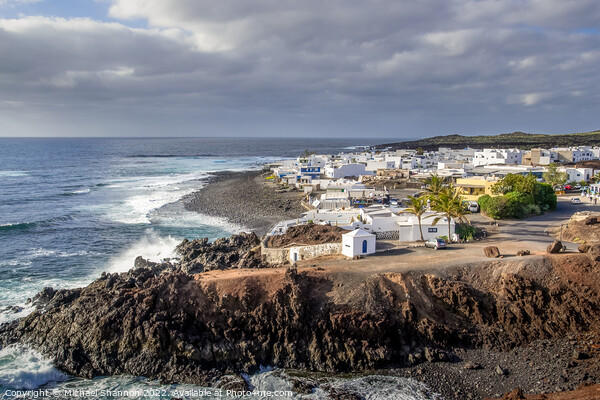 The small fishing village of El Golfo in Lanzarote Picture Board by Michael Shannon