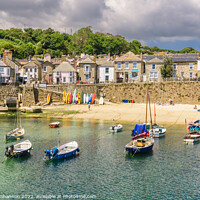 Buy canvas prints of The harbour and beach in Mousehole, Cornwall by Michael Shannon