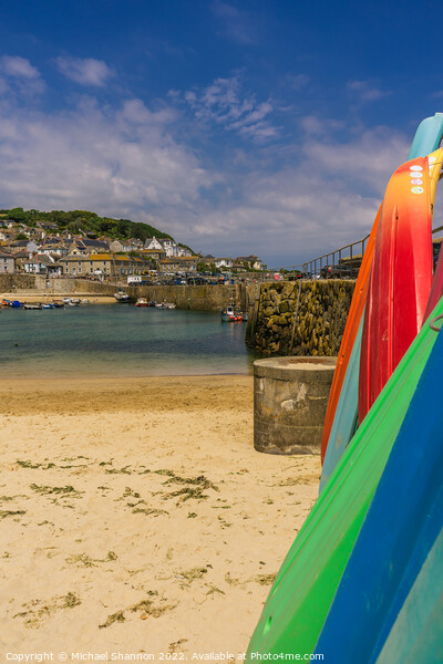 Surfboards stacked in Mousehole harbour, Cornwall Picture Board by Michael Shannon