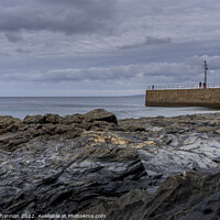 Buy canvas prints of Rocks and Pier, Porthleven Beach Cornwall by Michael Shannon