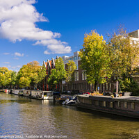 Buy canvas prints of Canal and house boats - Amsterdam by Michael Shannon