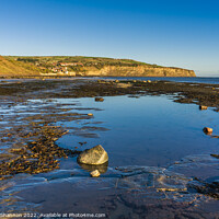 Buy canvas prints of Beach at Boggle Hole and view towards Robin Hood's by Michael Shannon