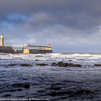 Buy canvas prints of East Pier - Whitby on a stormy day by Michael Shannon