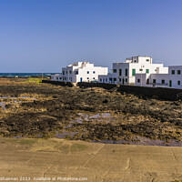 Buy canvas prints of Beachfront houses, Orzola, Northern Lanzarote. by Michael Shannon