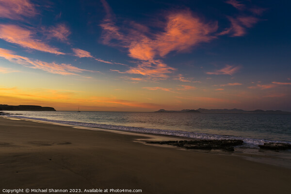 Early morning light at Papagayo beach, Lanzarote. Picture Board by Michael Shannon