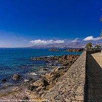 Buy canvas prints of Sea view southwards from the promenade in Puerto d by Michael Shannon