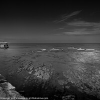 Buy canvas prints of Whitby's East Beach: A Monochrome Perspective by Michael Shannon