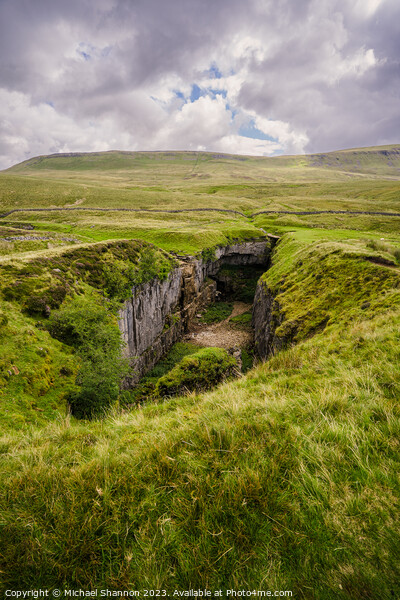 Hull Pot under an overcast sky - Yorkshire Dales N Picture Board by Michael Shannon