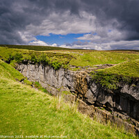 Buy canvas prints of Hull Pot, Ribblesdale under a moody sky in the Yor by Michael Shannon