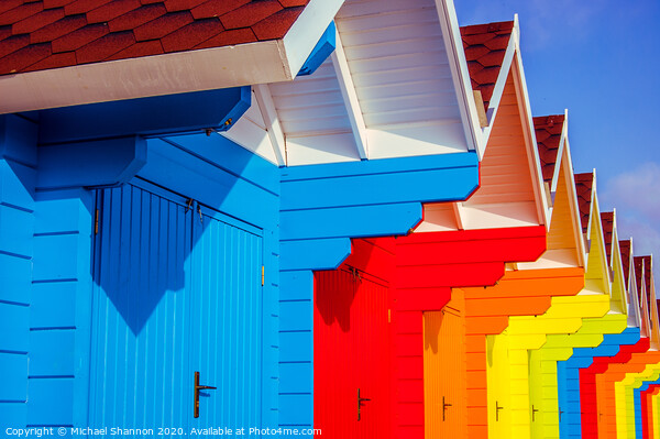 Row of Colourful Beach Huts Picture Board by Michael Shannon