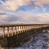 Buy canvas prints of Whitby West Pier on a stormy day by Michael Shannon
