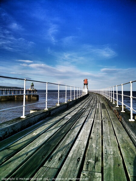 View along the East Pier at Whitby, North Yorkshir Picture Board by Michael Shannon