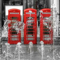Buy canvas prints of Iconic Red Phone Boxes by Sarah Paddison