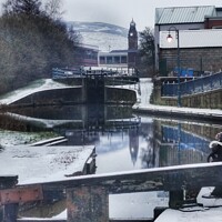 Buy canvas prints of Stalybridge reflecting in the Canal by Sarah Paddison