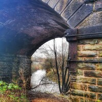 Buy canvas prints of View through the bridge to the river Tame - Ashton under Lyne by Sarah Paddison