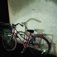 Buy canvas prints of Pink bicycle by Sarah Paddison