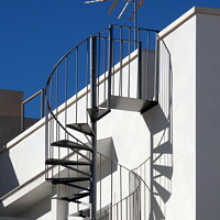 Buy canvas prints of Spiral Staircase and Shadow by Sheila Eames