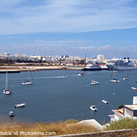 Buy canvas prints of Portimao across the Estuary from Ferraguda by Sheila Eames