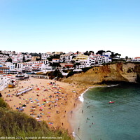 Buy canvas prints of Carvoeiro Beach and Village, Algarve by Sheila Eames