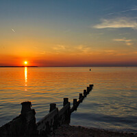 Buy canvas prints of Setting sun in Whitstable by Jonathan Moulton