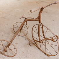 Buy canvas prints of an old children's tricycle 1930 by daniele mattioda