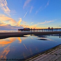 Buy canvas prints of North Pier Sunset by Michele Davis