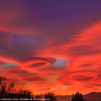 Buy canvas prints of a pink  sunset  of lenticular clouds by susanna mattioda