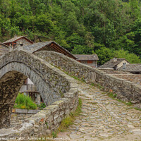 Buy canvas prints of  a  vintage  bridge  of an Italian alpine village by susanna mattioda