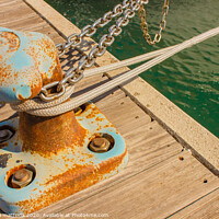Buy canvas prints of detail of a bollard with chains and ropes for moor by susanna mattioda