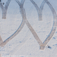 Buy canvas prints of imprint of two hearts drawn in the snow by susanna mattioda