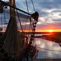 Buy canvas prints of Sunset at King’s Lynn fishing fleet  by Sam Owen