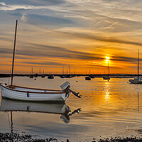 Buy canvas prints of Beautiful boots and sunset at Brancaster Staithe  by Sam Owen