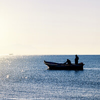 Buy canvas prints of Fisherman boat in silhouette by Antonio Gravante