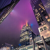 Buy canvas prints of Misty Night in Canary Wharf by Hiran Perera