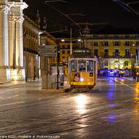 Buy canvas prints of Tram at Night, Lisbon, Portugal by Hiran Perera
